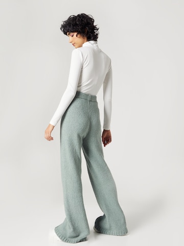 florence by mills exclusive for ABOUT YOU Flared Trousers 'Robin' in Green