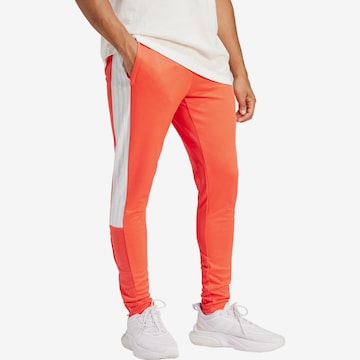 ADIDAS SPORTSWEAR Slim fit Workout Pants 'Tiro' in Orange