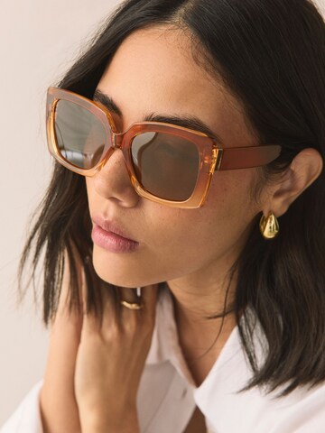 Next Sončna očala | oranžna barva
