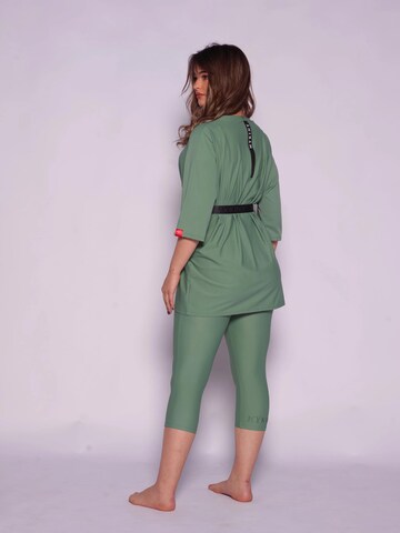 MYKINY BRAND High neck Swimsuit 'Majda semi-burkini Pistache Green' in Green