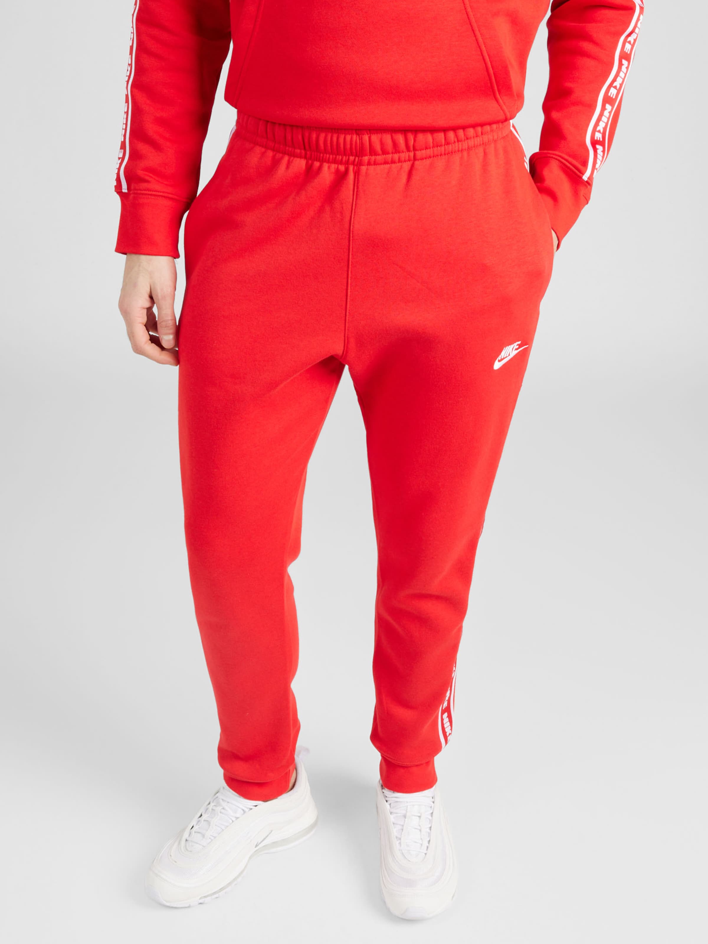 Red nike club fleece pants sale