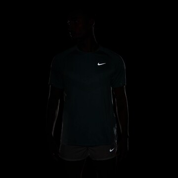 NIKE Performance Shirt 'DFADV STRIDE' in Blue