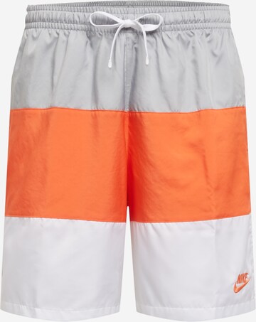 Nike Sportswear Štandardný strih Nohavice - oranžová: predná strana