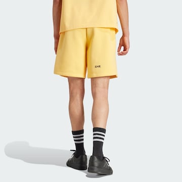 ADIDAS SPORTSWEAR Loose fit Workout Pants 'Z.N.E. Premium' in Yellow