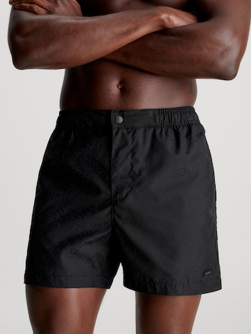 Calvin Klein Swimwear Board Shorts in Black: front