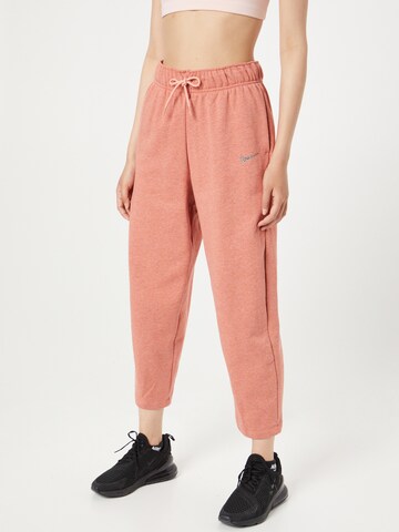 Nike Sportswear - Loosefit Calças em laranja: frente