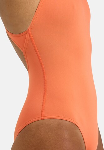 ARENA Korzet Jednodielne plavky 'TEAM PRO SOLID' - oranžová