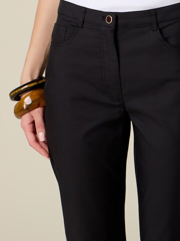 Skinny Pantaloni di oltre in nero