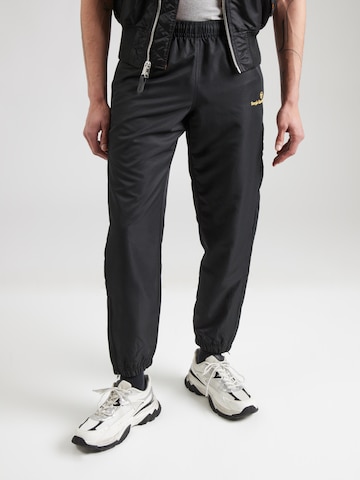 Sergio TacchiniTapered Hlače 'CARSON' - crna boja: prednji dio