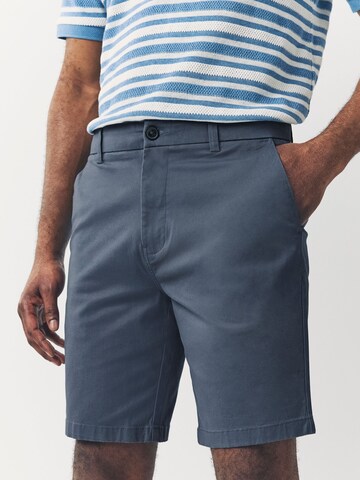 Next Slimfit Chinobyxa i blå