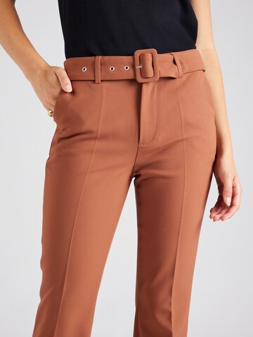 ABOUT YOU x Iconic by Tatiana Kucharova Flared Trousers with creases 'Farina' in Brown