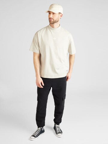 ADIDAS ORIGINALS Bluser & t-shirts 'MOCK' i beige