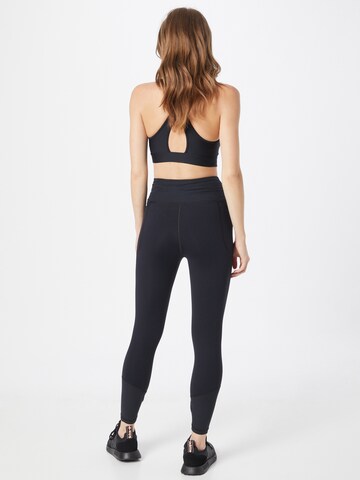 UNDER ARMOUR Skinny Workout Pants 'Meridian' in Black