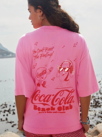 Next - Camisa em rosa: frente