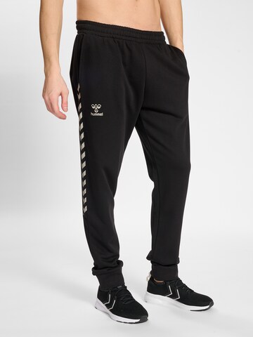 Hummel Tapered Sportbroek 'Staltic' in Zwart: voorkant