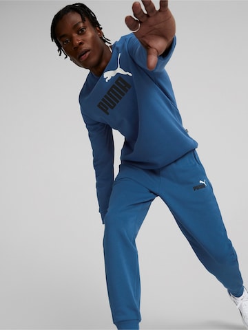 Tapered Pantaloni sport 'ESS+' de la PUMA pe albastru