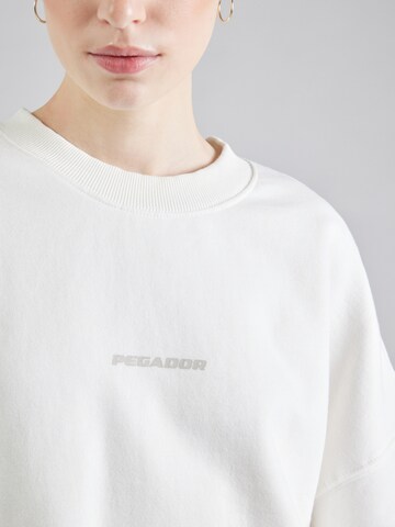 Sweat-shirt 'TORY' Pegador en blanc