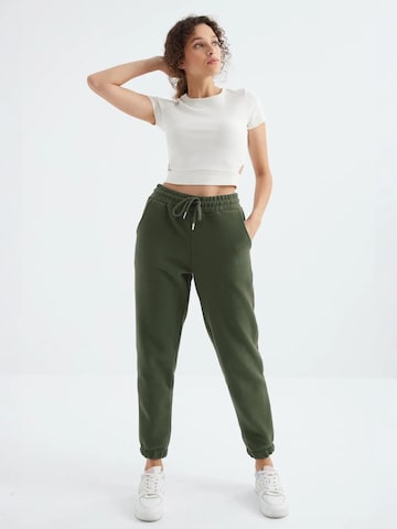 Regular Pantalon de sport Tommy Life en vert
