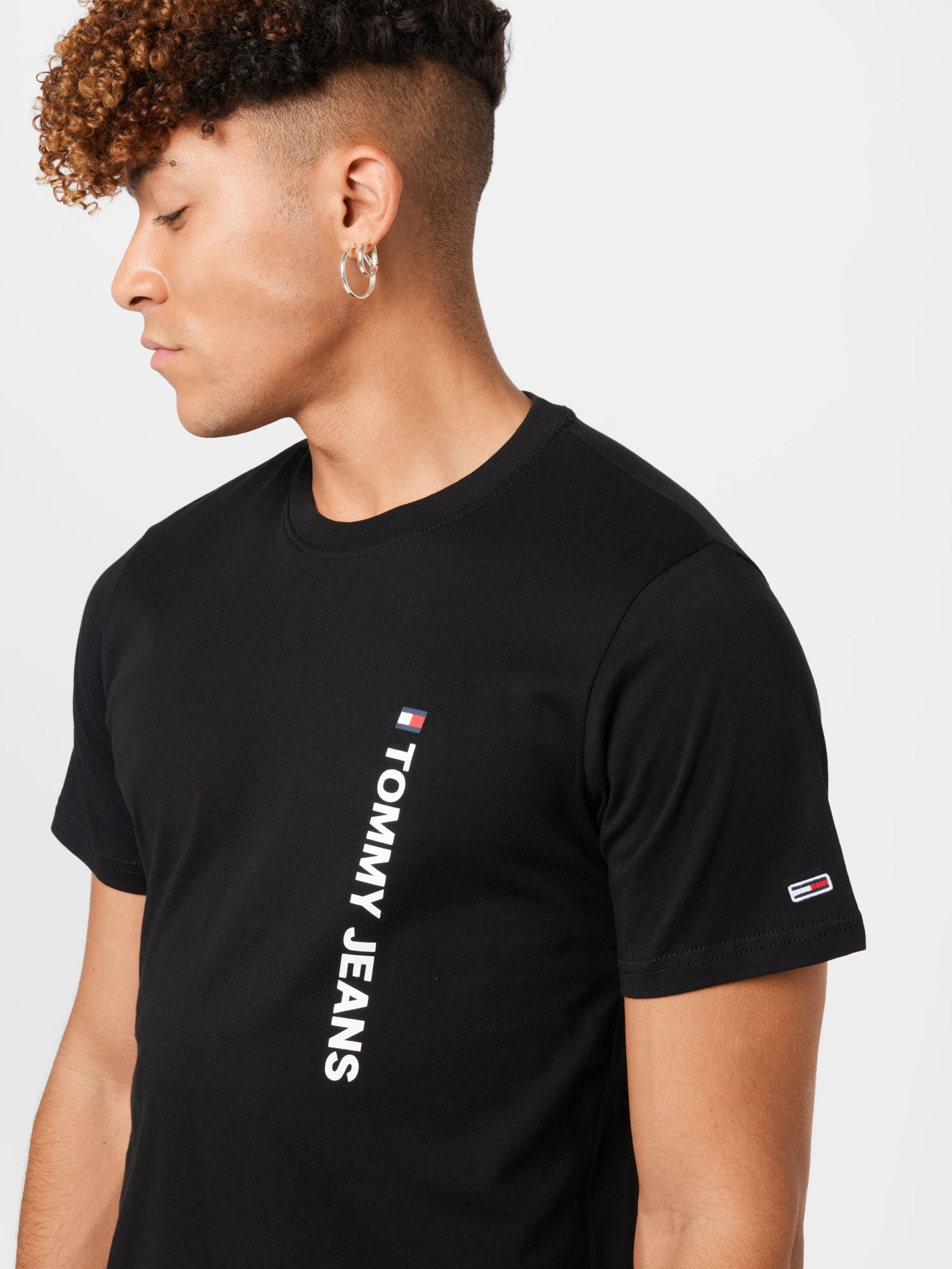 Männer Shirts Tommy Jeans T-Shirt in Schwarz - WX81130