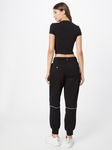 PUMA Tapered Workout Pants in Black