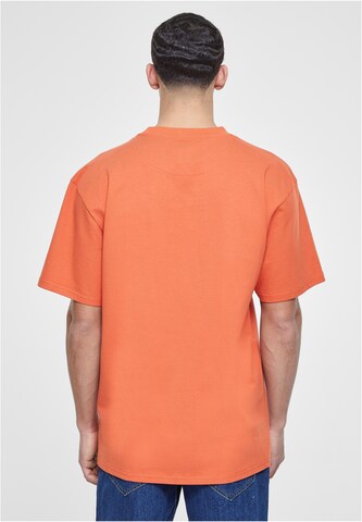 Maglietta di Karl Kani in arancione