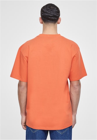 Karl Kani T-Shirt in Orange