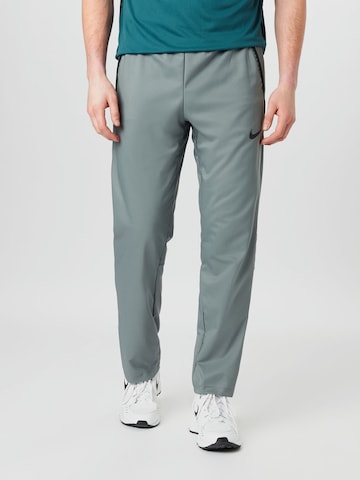 NIKE Regular Sportbroek 'Dry Woven' in Grijs: voorkant