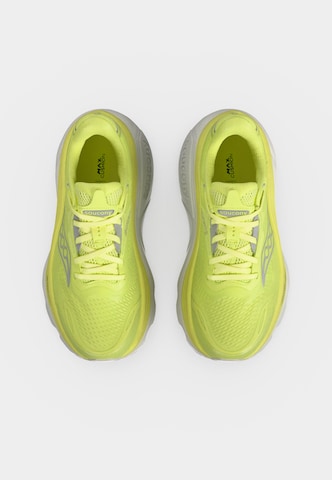 Chaussure de course saucony en jaune