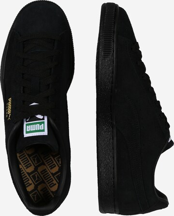 Baskets basses 'Classic XXI' PUMA en noir