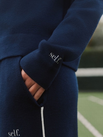 Veste de survêtement self. en bleu