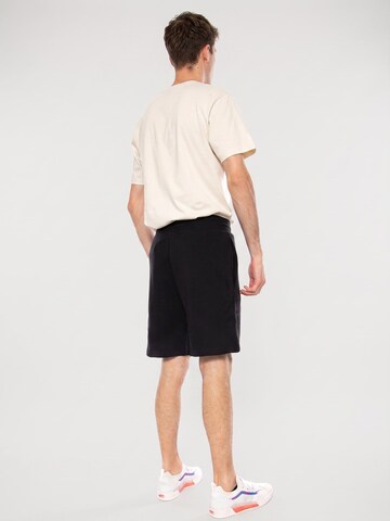 Baggy Pantaloni 'M SD LT RG SHTS TNF BLACK' di THE NORTH FACE in nero