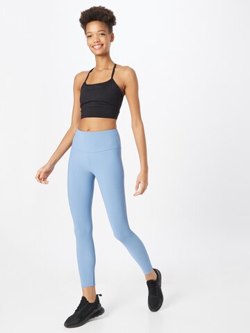 Onzie Skinny Workout Pants in Blue