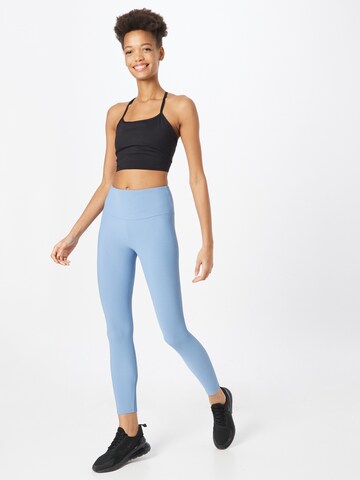 Onzie Skinny Leggings in Blau