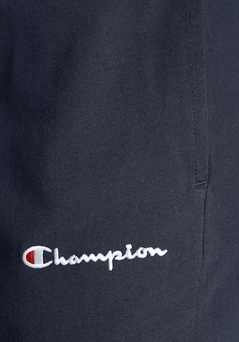 Champion Authentic Athletic Apparel Normalny krój Spodnie w kolorze niebieski