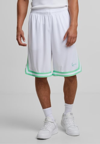 Karl Kani Regular Trousers in White: front