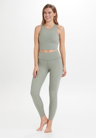 Athlecia Slim fit Workout Pants 'Franz' in Green