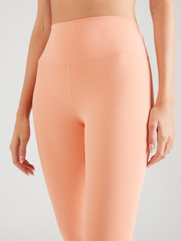 NIKE Skinny Fit Спортен панталон 'ONE' в оранжево