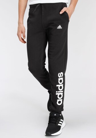 ADIDAS SPORTSWEAR Tapered Workout Pants 'Essentials Linear Logo' in Black: front
