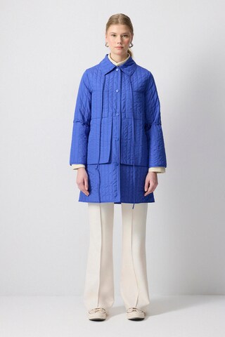 Touche Prive Tussenjas in Blauw