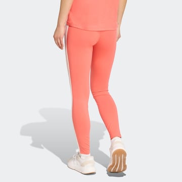 ADIDAS SPORTSWEAR - Skinny Pantalón deportivo 'Essentials' en naranja