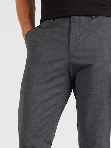 Slimfit Pantaloni con piega frontale 'Hesten' di HUGO in grigio