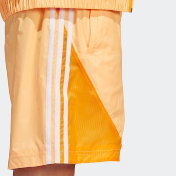 ADIDAS ORIGINALS Regular Pants 'SST' in Orange