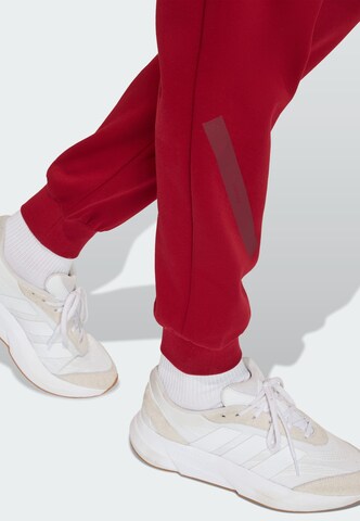 ADIDAS SPORTSWEAR Tapered Pants 'Z.N.E' in Red