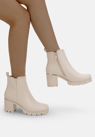 Elara Ankle Boots in Beige