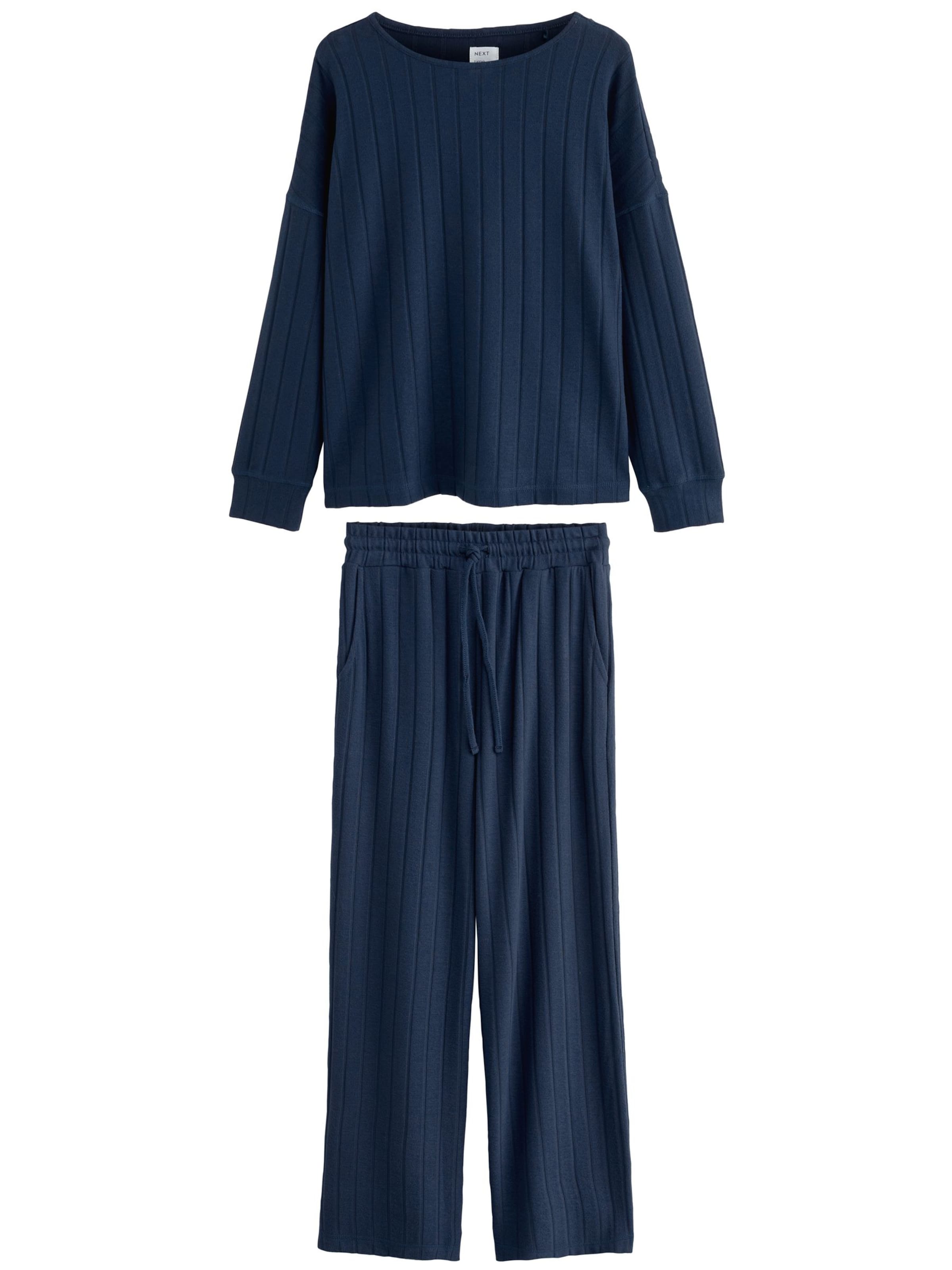 zils Next Mājas apģērbs: no priekšpuses