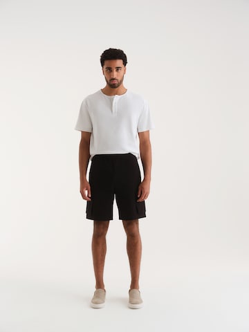 ABOUT YOU x Kevin Trapp Regular Cargo trousers 'John' in Black