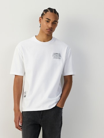 T-Shirt Next en blanc : devant