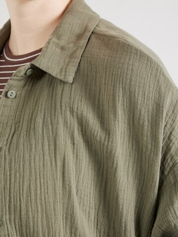 Camicia da donna 'CARTHYRA' di ONLY Carmakoma in verde