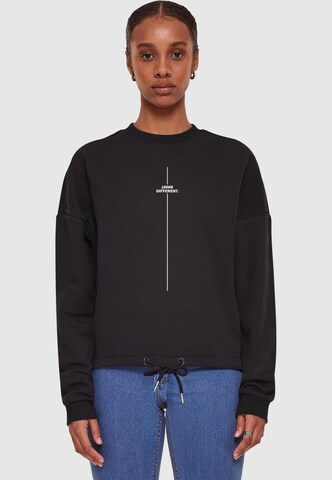 Merchcode Sweatshirt 'Think Different' in Black: front