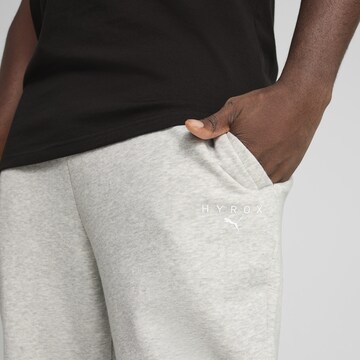 PUMA Slim fit Sports trousers 'Puma x Hyrox' in Grey